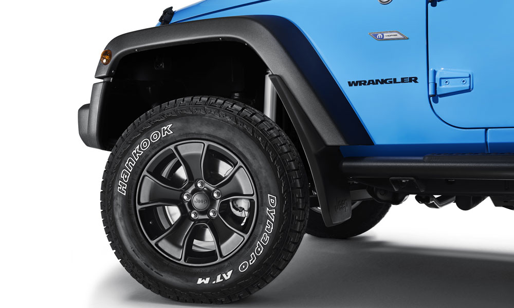 The Mopar ONE package for the Jeep Wrangler includes 17- by   Performance Gladiator black alloy wheels fitted with 265/70 R 17 Hankook  Dynapro tires. | Stellantis Blog